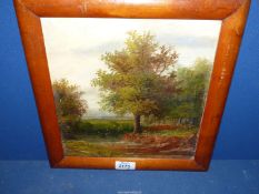 A 19th century Oil on canvas in a Maple frame of a landscape with trees and a pond, signed,