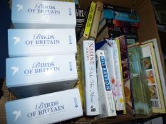 A box of Books to include Cookbooks, Birds of Britain, Wilbur Smith, James Herbert, etc.