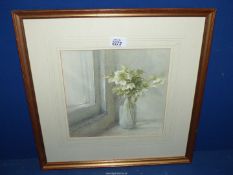 A framed and mounted Watercolour depicting Hellebores in a milk bottle on a window sill,