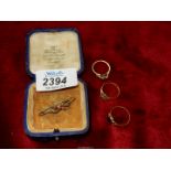 Three 9ct Gold rings; two set with Diamond chips, the other with Cornelian,