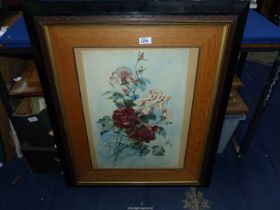 A large wooden framed and mounted watercolour depicting a bunch of roses, no visible signature,