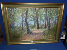 A framed Imee Wilson Oil on board depicting a woodland scene.