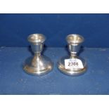 A pair of weighted Silver candlesticks, Birmingham, some small dings, 2 3/4" tall.