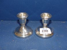 A pair of weighted Silver candlesticks, Birmingham, some small dings, 2 3/4" tall.