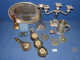 A quantity of mixed metal items including candelabra, horse brasses, tankard, etc.