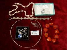 A quantity of jewellery including a 925 torque necklace, garnet pendant, 925 bracelet,