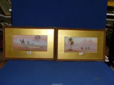 A pair of gilt framed Egyptian Watercolours one signed lower right D.H. Pinder.