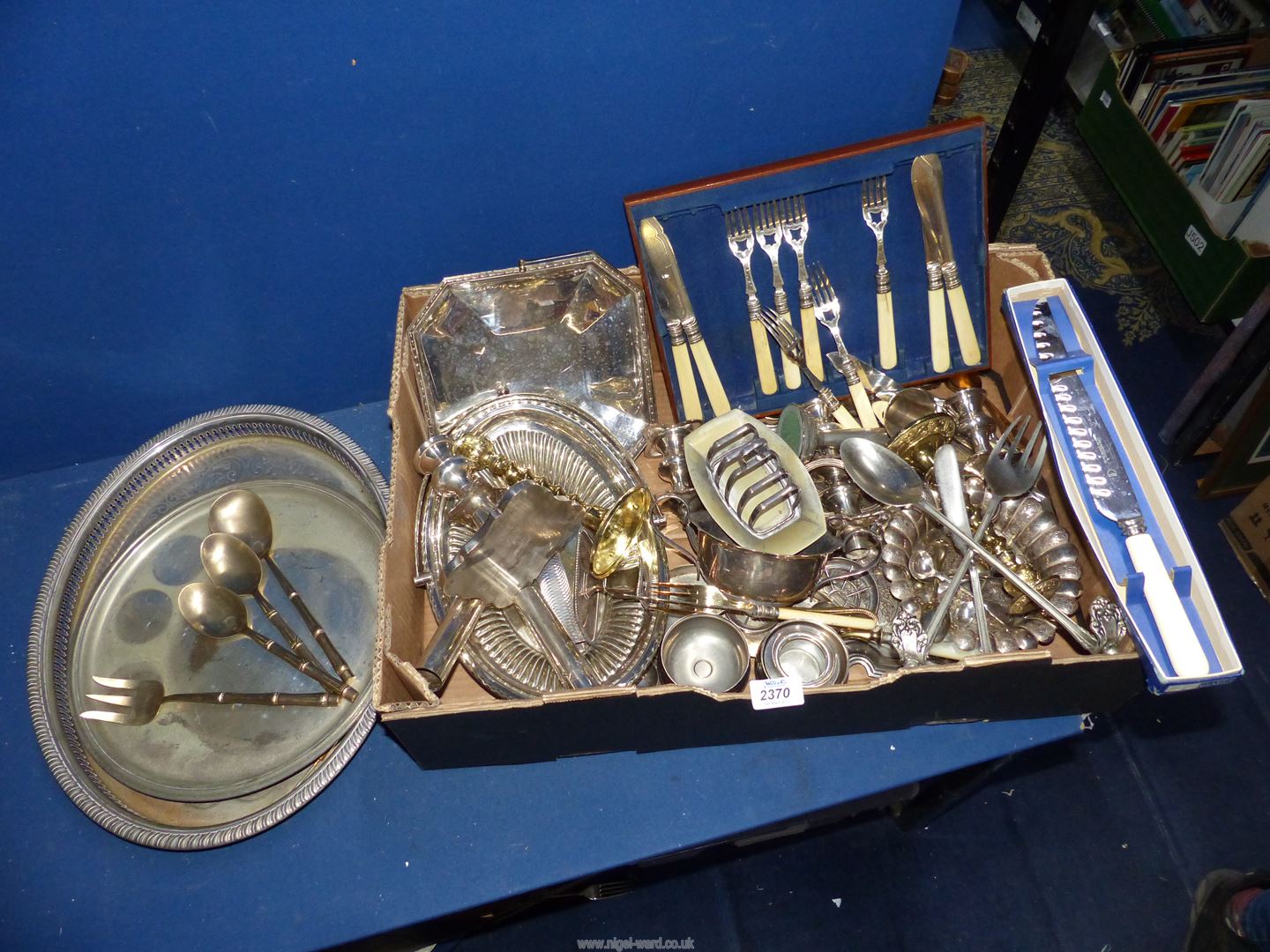 A quantity of silver plate including fish eaters, salvers, goblets, trays, cutlery, etc.