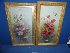 A pair of gilt framed Oil paintings depicting flowers and butterflies, 12 3/4" x 22 3/4".