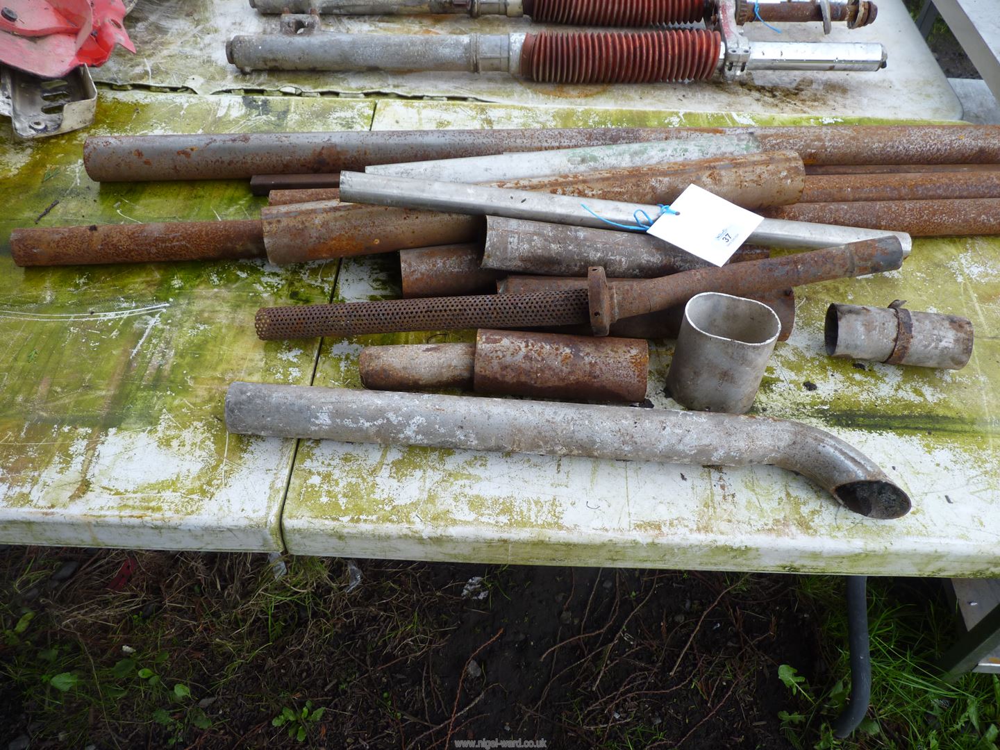 A quantity of steel tubing, various sizes and lengths.