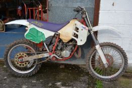 A 1991 KTM 125 motocross motorcycle with two-stroke, single cylinder, water cooled engine,