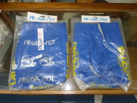 Two blue Suzuki seat covers.