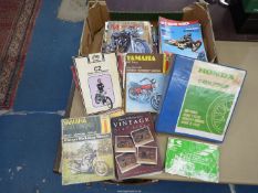 A quantity of motorcycle magazines and including manuals for Honda CBX 750F,