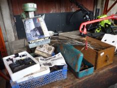 A drawer of miscellaneous including multi tools, a quantity of brake and other cables,