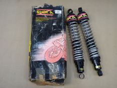 A pair of new (boxed) Shoka multi-fit shock absorbers/spring units.