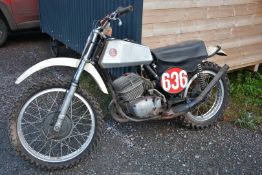 A 1973 CZ 250 motocross motorcycle, the two-stroke, single cylinder, air cooled engine No.