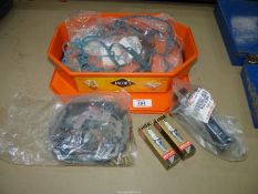 A quantity of gaskets and two new boxed NGK Gold Palladium BR8 EV spark plugs.