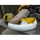 A Suzuki petrol tank plus another, a seat, an intake housing and a new white front mudguard.