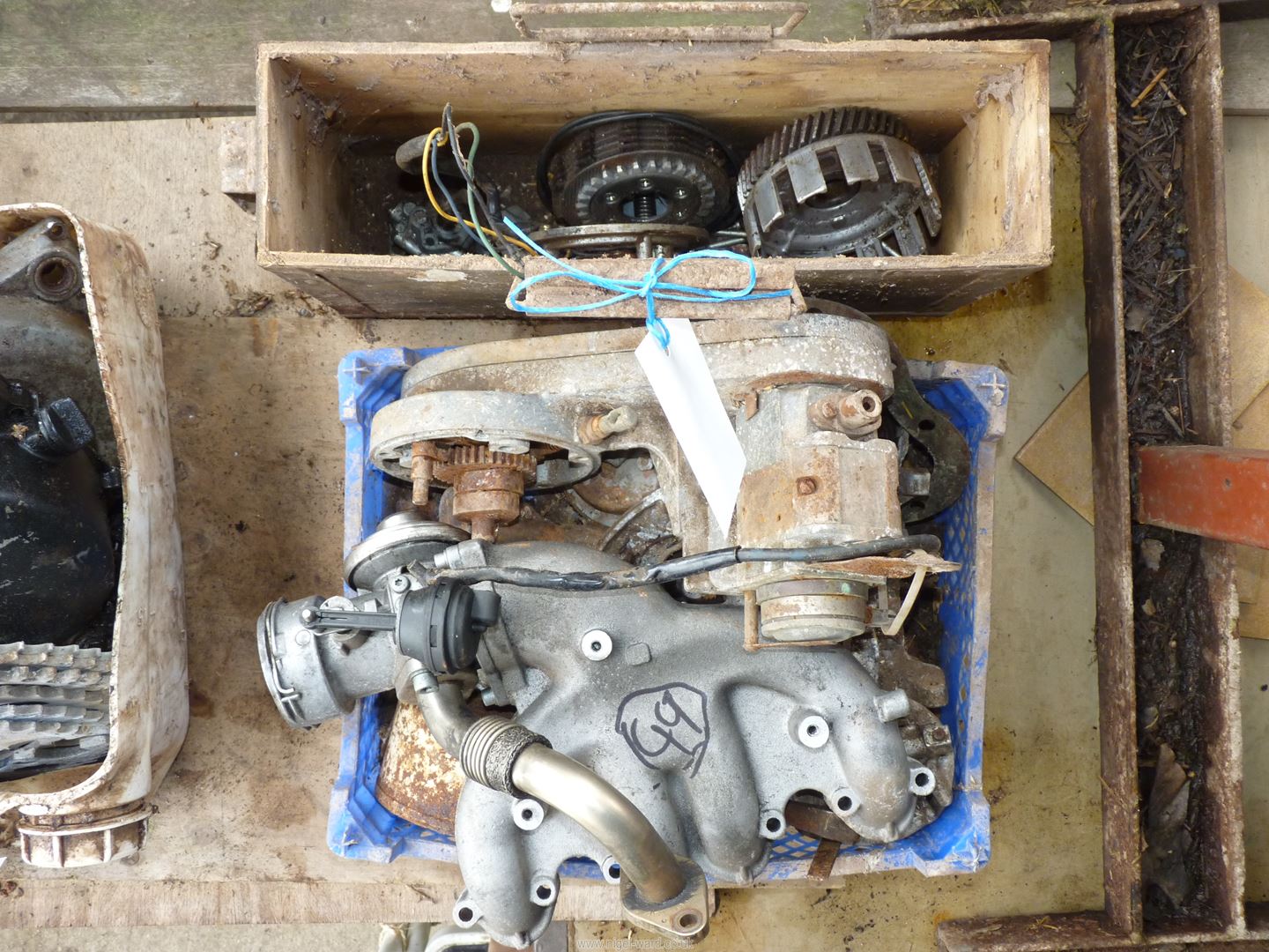 A toolbox, clutch parts, a JAP engine drive housing with BTH single cylinder magneto,