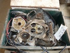 A box of KTM engine and gearbox components.