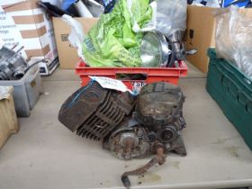 A Yamaha 100 cc engine , no. 3V6/012092 and a box of carburettors, a headlamp, etc.