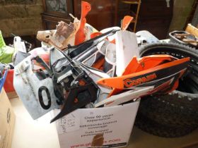 A box of KTM plastics.