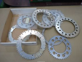 Ten various alloy sprockets.