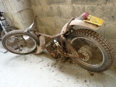 A motorcycle frame with a two-stroke, single cylinder air-cooled engine, etc, frame and engine No.