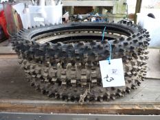 Three unused 80/100 x 21" aggressive tread pattern tyres, (two of Bridgestone/one of Pirelli).