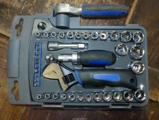 A plastic cased 3/8'' drive socket set with adjustable spanner/ratchet, ratchet screwdriver bits,