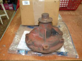 A tractor water pump, (used, but appears serviceable).