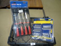 A four piece wood chisel set and an Irwin 32 piece posi, conventional straight bit and torq bits..