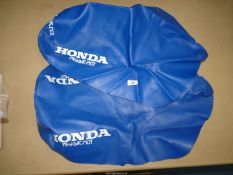 Two blue Honda seat covers