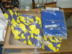 Two Suzuki seat covers : blue and yellow.