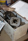 A steel toolbox containing Suzuki 120? (believed 118 cc) two-stroke, single cylinder,