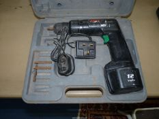 A cased Skil 12 volt cordless drill and charger.