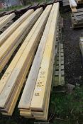 12 lengths of softwood timber 5" x 1 1/2" x 213" long.