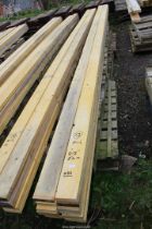 12 lengths of softwood timber 5" x 1 1/2" x 213" long.
