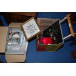 A box of curtains, buttons, Laura Ashley fabric etc plus some embroideries.