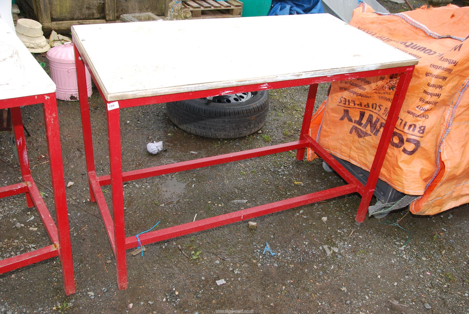 A metal framed Workbench, 48'' x 24'' x 34'' high.