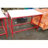 A metal framed Workbench, 48'' x 24'' x 34'' high.