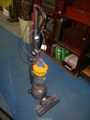 A Dyson DC40 Vacuum Cleaner.