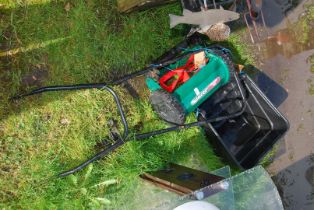 A Qualcast push-along Lawn Mower with grass box.