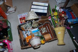 A quantity of miscellanea including artificial flowers, table lamps, Jersey Pottery,