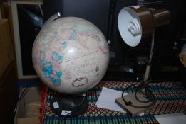 A light up Globe and an adjustable desk lamp.