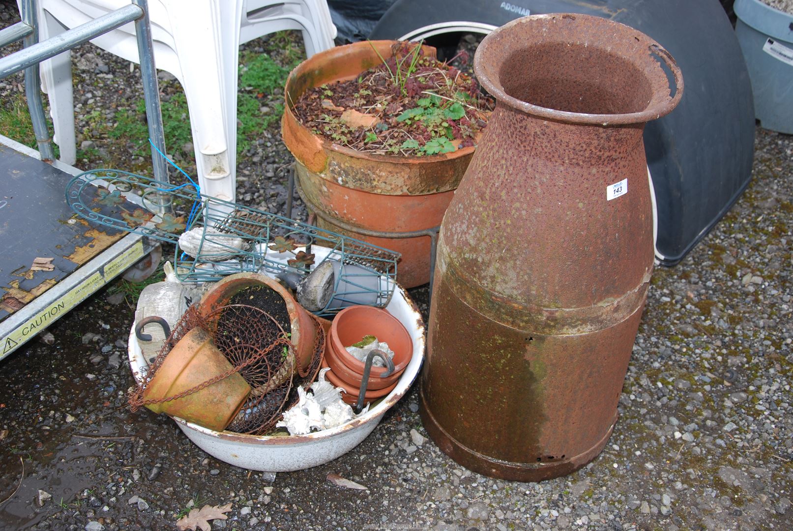 A Milk Churn (a/f), terracotta pot in stand (a/f) and enamel bowl and contents.