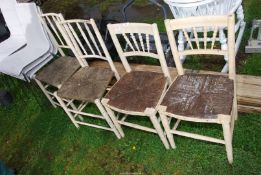 Two pairs of seagrass seated Chairs.