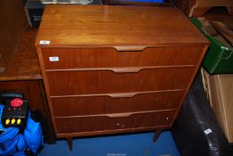 A Teak four drawer 'Austin Suite' chest of drawers 31 1/2" wide c 16" deep x 3ft high.