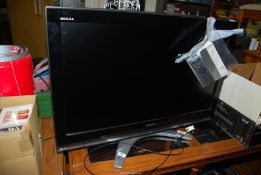 A Toshiba Regza 36" LCD TV with remote.