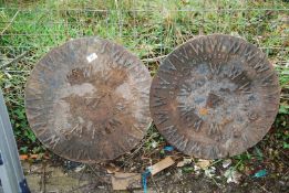 Two cast iron circular manhole covers, 19 1/2'' diameter.